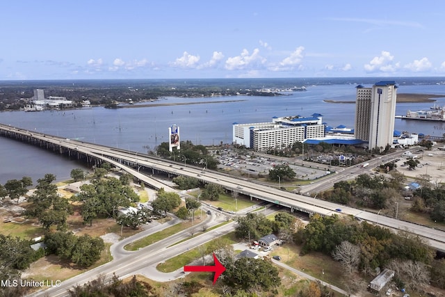 drone / aerial view with a water view