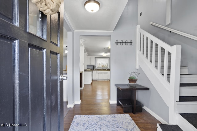 foyer featuring dark hardwood / wood-style floors