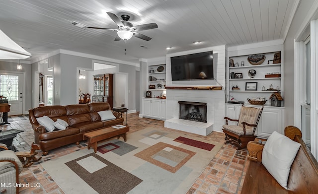 209 Lake Terrace Pl, Brandon, MS 39047 - living room with a ceiling fan, a large fireplace, brick floors, built in features, and wood ceiling