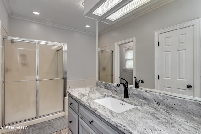 209 Lake Terrace Pl, Brandon, MS 39047 - bathroom with crown molding, vanity, a shower stall, and recessed lighting
