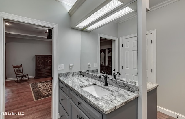 209 Lake Terrace Pl, Brandon, MS 39047 - bathroom featuring vanity, crown molding, and wood finished floors
