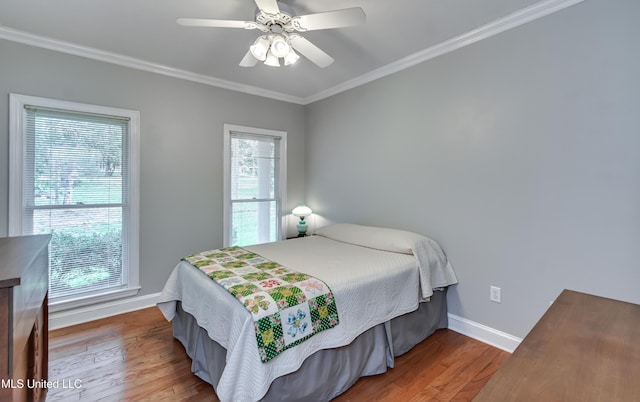 209 Lake Terrace Pl, Brandon, MS 39047 - bedroom featuring crown molding, wood finished floors, and a ceiling fan