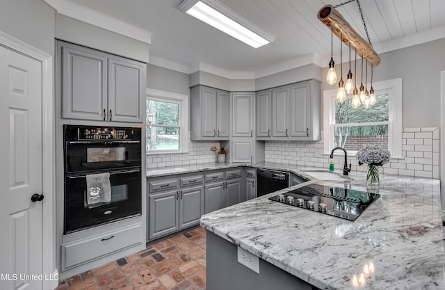 209 Lake Terrace Pl, Brandon, MS 39047 - kitchen with gray cabinets, black appliances, brick flooring, light stone countertops, and ornamental molding