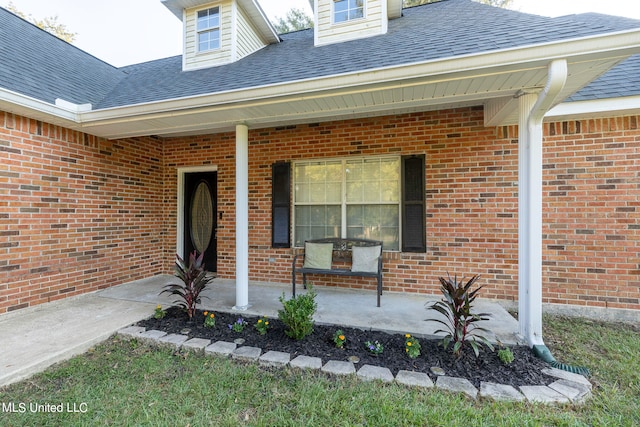 doorway to property featuring a porch