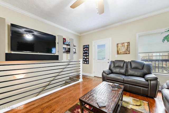 208 E Orchard Loop Unit 208, Diberville, MS 39540 - living room featuring wood finished floors, ornamental molding, and ceiling fan