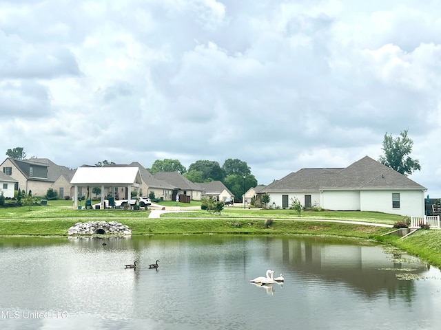 property view of water with a gazebo