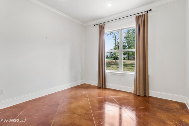empty room featuring a healthy amount of sunlight and crown molding