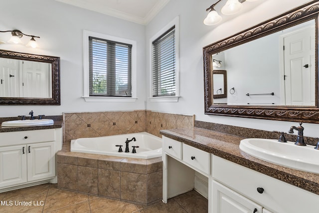 bathroom with tile patterned flooring, vanity, tiled bath, and crown molding