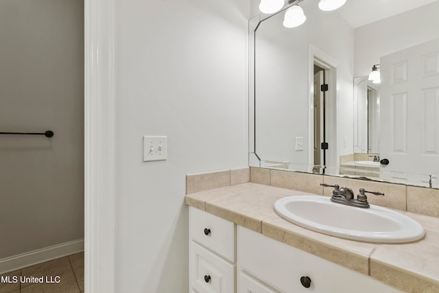 bathroom featuring tile patterned floors and vanity