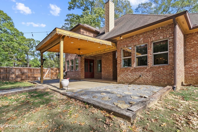 rear view of house featuring a patio area