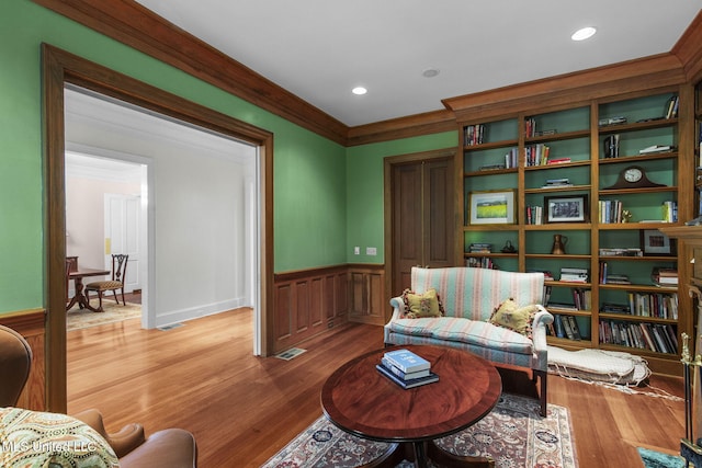 169 Pine Hill Dr, Brandon, MS 39047 - sitting room featuring wainscoting, light wood-type flooring, crown molding, and recessed lighting