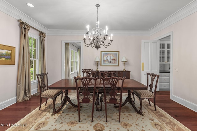 169 Pine Hill Dr, Brandon, MS 39047 - dining space featuring a chandelier, wood finished floors, and crown molding