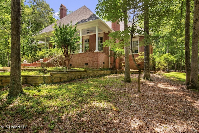 169 Pine Hill Dr, Brandon, MS 39047 - view of front of home featuring a chimney, brick siding, ceiling fan, and crawl space