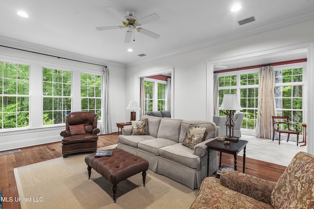169 Pine Hill Dr, Brandon, MS 39047 - living room with healthy amount of natural light, ceiling fan, ornamental molding, recessed lighting, and wood finished floors