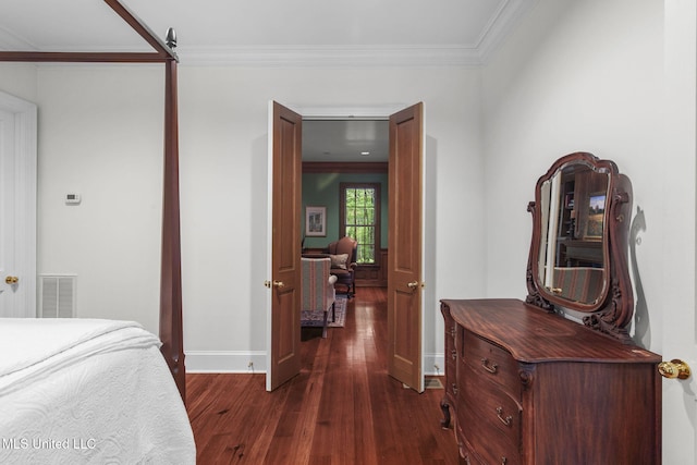 169 Pine Hill Dr, Brandon, MS 39047 - bedroom featuring dark wood-type flooring and crown molding