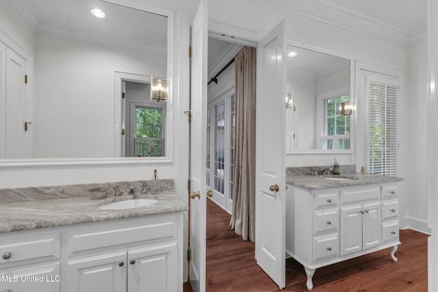169 Pine Hill Dr, Brandon, MS 39047 - bathroom with crown molding, vanity, wood finished floors, and recessed lighting