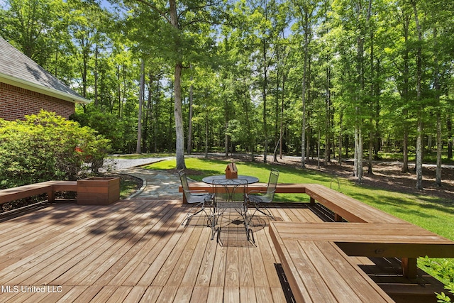 169 Pine Hill Dr, Brandon, MS 39047 - deck with outdoor dining area and a lawn