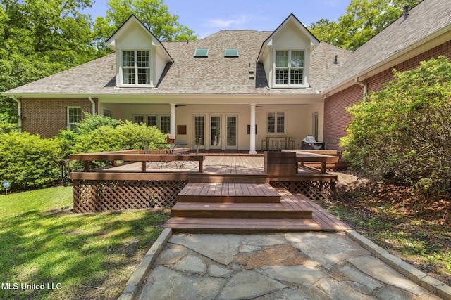 169 Pine Hill Dr, Brandon, MS 39047 - back of house featuring french doors, a wooden deck, a lawn, a shingled roof, and stucco siding