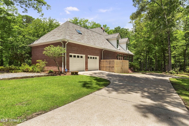 169 Pine Hill Dr, Brandon, MS 39047 - view of side of property with driveway, a shingled roof, brick siding, and a garage