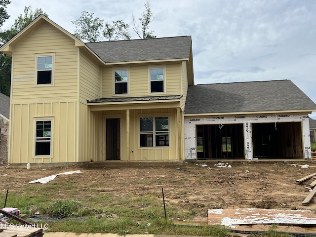 615 Cobalt Way, Brandon, MS 39042 - view of front of property featuring board and batten siding, a shingled roof, a garage, a standing seam roof, and a metal roof