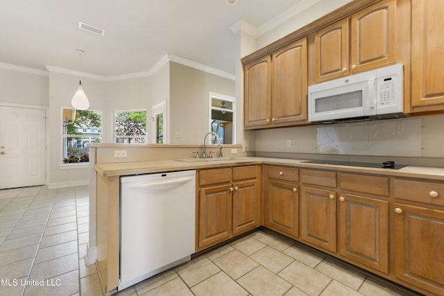 426 Carmargue Ln, Biloxi, MS 39531 - kitchen with white appliances, a sink, light tile patterned flooring, a peninsula, and ornamental molding