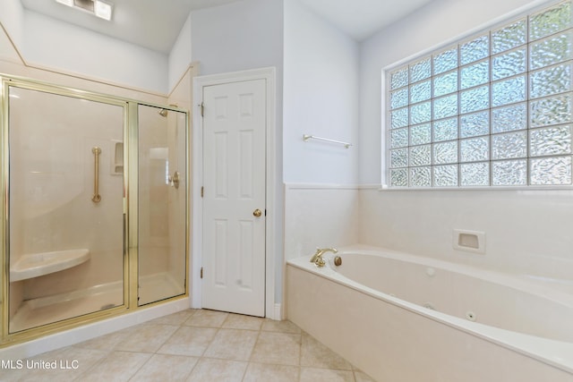 426 Carmargue Ln, Biloxi, MS 39531 - full bathroom with a whirlpool tub, a stall shower, and tile patterned flooring