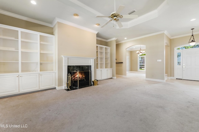 426 Carmargue Ln, Biloxi, MS 39531 - unfurnished living room featuring carpet flooring, a premium fireplace, crown molding, a ceiling fan, and recessed lighting