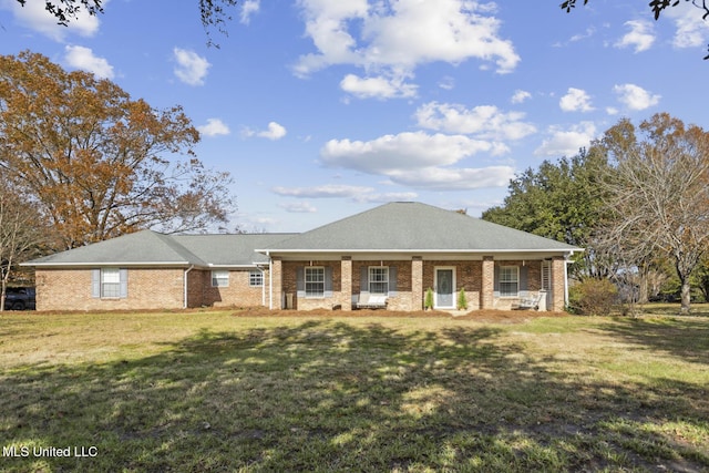 ranch-style home with a front yard and a porch