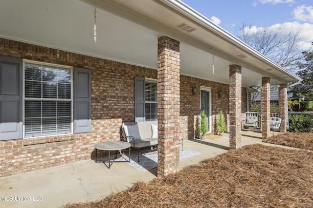 view of patio featuring covered porch