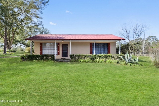 ranch-style house featuring a front yard and a porch