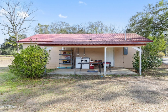 back of house featuring a patio area