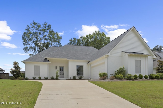 119 Paylors Way, Madison, MS 39110 - modern inspired farmhouse with driveway, an attached garage, a front yard, and a shingled roof