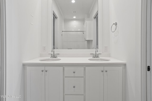119 Paylors Way, Madison, MS 39110 - full bathroom with double vanity, a tile shower, and recessed lighting