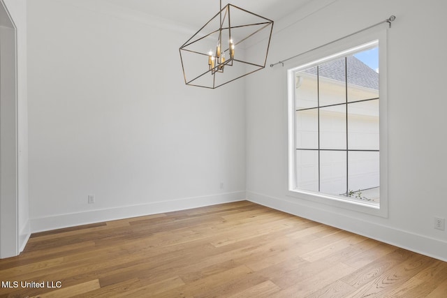 119 Paylors Way, Madison, MS 39110 - spare room featuring light wood-style floors and a chandelier