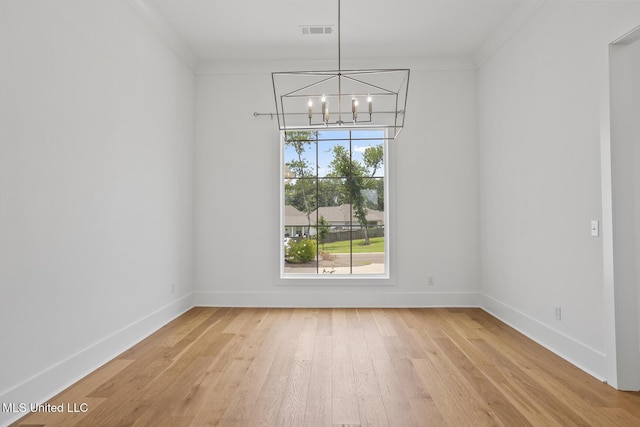 119 Paylors Way, Madison, MS 39110 - spare room featuring a chandelier, light wood-type flooring, and ornamental molding