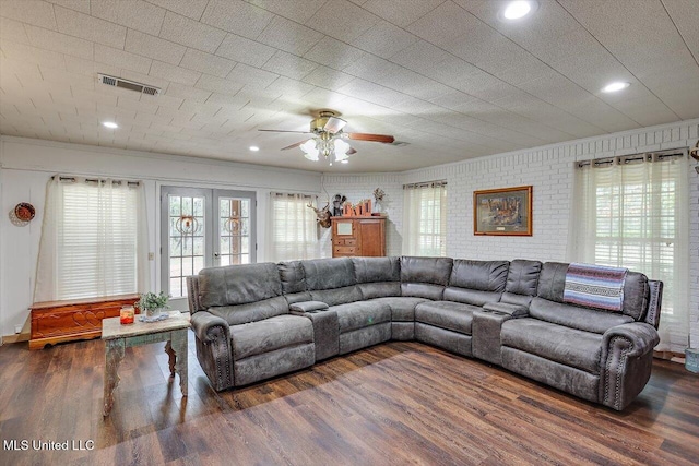 living room with french doors, ceiling fan, and dark hardwood / wood-style flooring