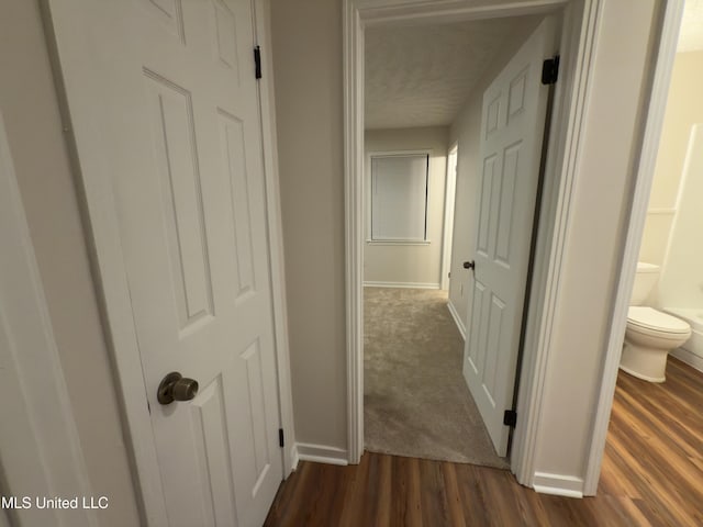 138 William Mckinley Cir, Jackson, MS 39213 - hallway featuring dark wood finished floors and baseboards