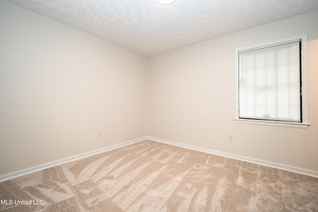 138 William Mckinley Cir, Jackson, MS 39213 - empty room with light carpet, a textured ceiling, and baseboards