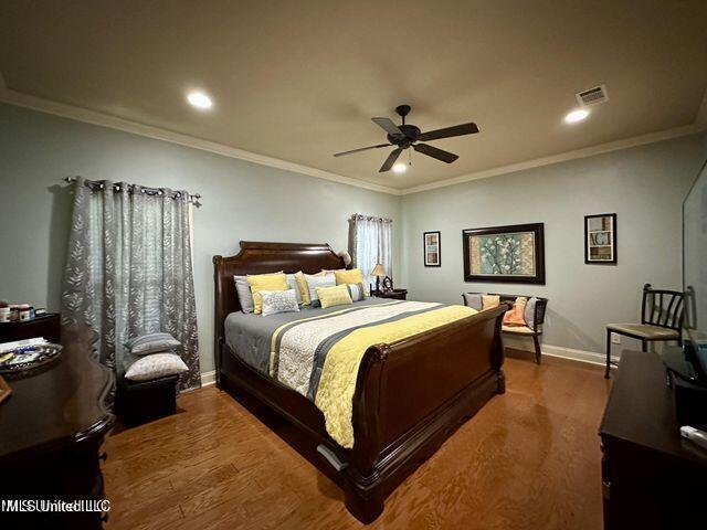 139 Glen Auburn Dr, Clinton, MS 39056 - bedroom featuring baseboards, wood finished floors, recessed lighting, crown molding, and a ceiling fan