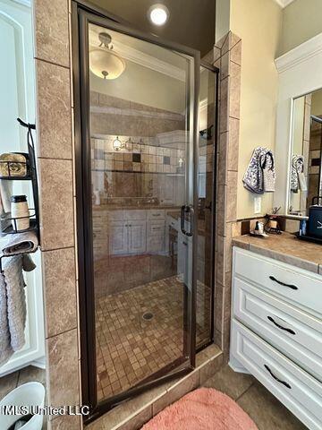 139 Glen Auburn Dr, Clinton, MS 39056 - full bath featuring a shower stall, tile patterned flooring, and vanity
