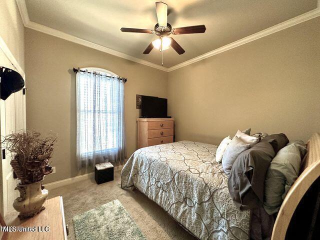 139 Glen Auburn Dr, Clinton, MS 39056 - carpeted bedroom with ceiling fan and ornamental molding