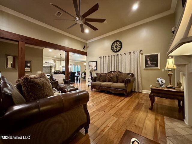 139 Glen Auburn Dr, Clinton, MS 39056 - living room with a ceiling fan, crown molding, light wood finished floors, recessed lighting, and baseboards