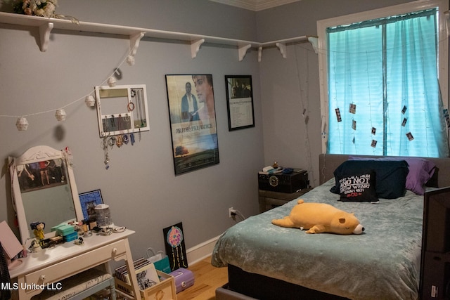 962 Glen Oaks Dr, Pass Christian, MS 39571 - bedroom featuring light wood-style flooring and baseboards
