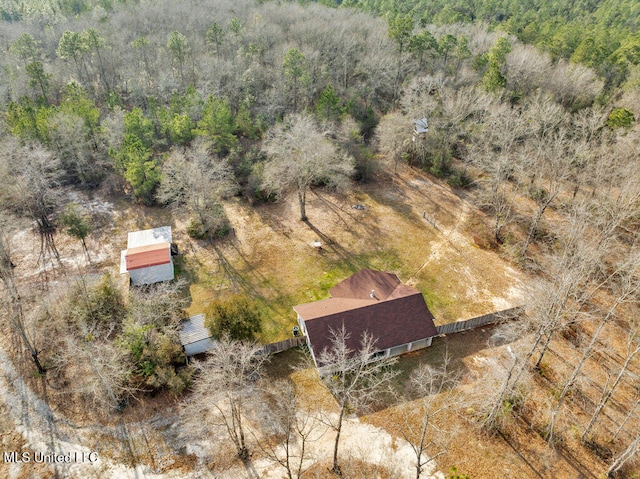 aerial view featuring a view of trees