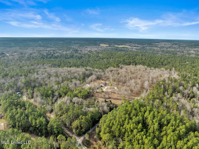 bird's eye view featuring a view of trees