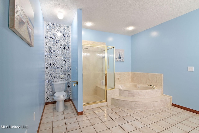 bathroom with tile patterned floors, shower with separate bathtub, a textured ceiling, and toilet