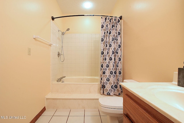 full bathroom featuring vanity, shower / tub combo with curtain, tile patterned floors, and toilet