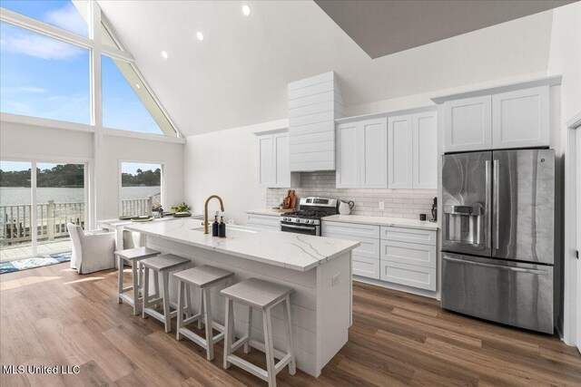 kitchen with white cabinetry, sink, and appliances with stainless steel finishes