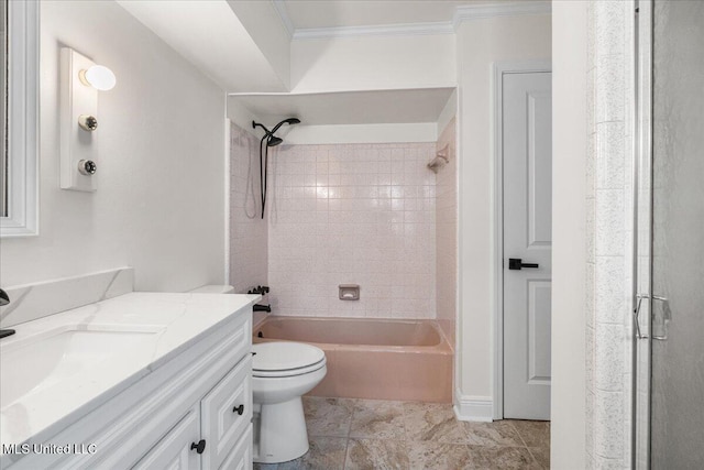 full bathroom with ornamental molding, vanity, toilet, and tiled shower / bath