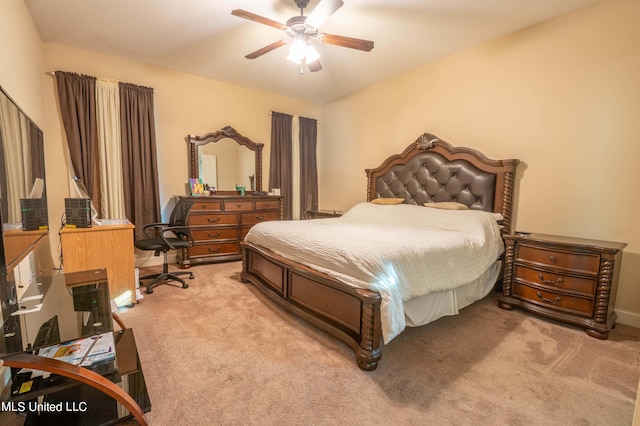 bedroom featuring a ceiling fan and light colored carpet